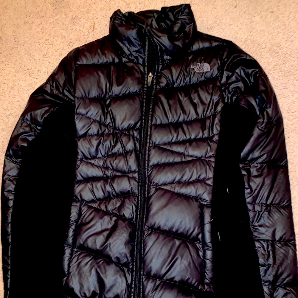 All black womans north face winter jacket